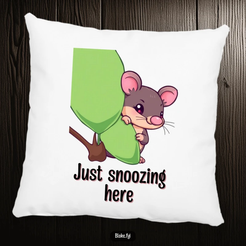 Funny platypus pillow featuring a curious character peeking from behind a eucalyptus leaf, perfect for humorous comfort.